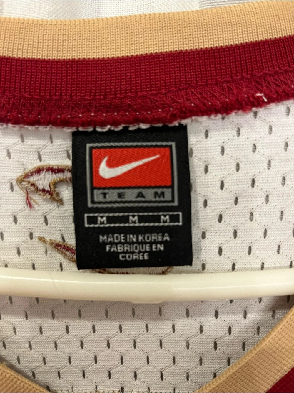 Nike White Kids Athletic Shorts with Red and Gold Trim